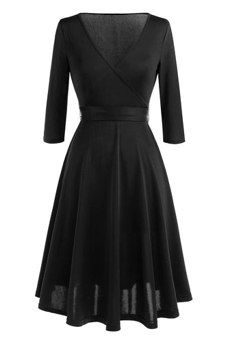 Vestido negro vintage de la década de 1950 con faja