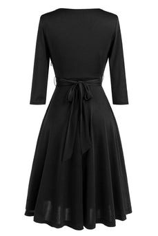 Vestido negro vintage de la década de 1950 con faja