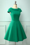 Vestido con cuello barco verde de los años 50