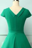 Vestido con cuello barco verde de los años 50