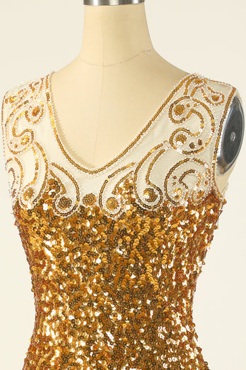 Vestido de lentejuelas doradas con cuello en V de la década de 1920