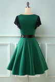 Vestido swing verde de la década de 1950 con encaje