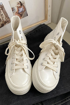 Zapatillas blancas de lona con cordones altos
