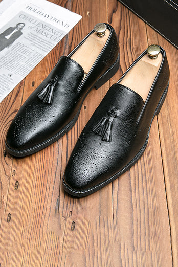 Zapatos de hombre con flecos de cuero negro