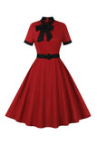 Vestido de swing rojo de la línea A de la década de 1950 con cinturón