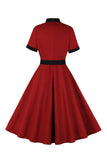 Vestido de swing rojo de la línea A de la década de 1950 con cinturón