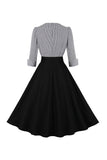 Vestido de manga larga a cuadros de la década de 1950 con cinturón