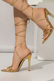 Sandalias de tacón de aguja doradas con cordones