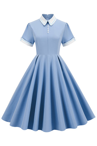 Vestido vintage azul claro de la década de 1950 con mangas