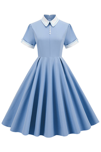 Vestido vintage azul claro de la década de 1950 con mangas