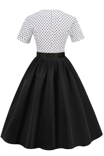 Vestido de lunares blancos y negros Vintage de la década de 1950