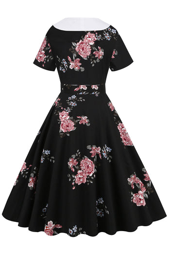 Vestido vintage negro estampado floral con cinturón