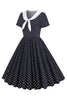 Cargar imagen en el visor de la galería, Vestido de lunares blancos y negros Vintage de la década de 1950 con Bowknot