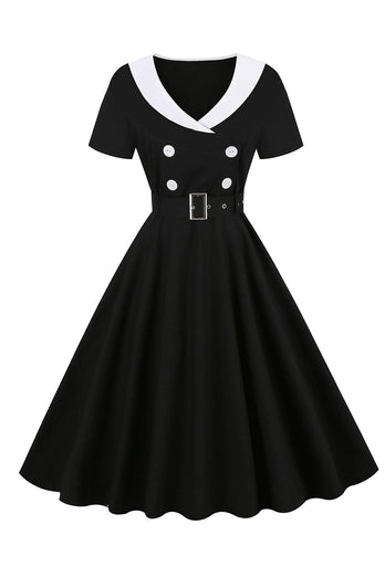 Vestido swing negro de la década de 1950 con cinturón