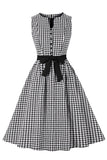 Vestido swing a cuadros negro de la década de 1950