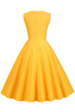 Vestido amarillo retro de la década de 1950 con ojo de cerradura