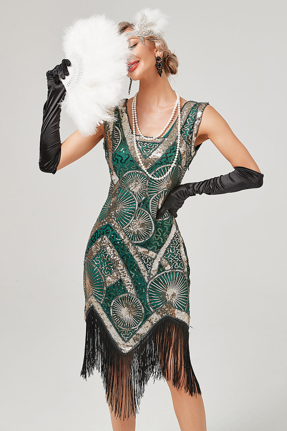 Vestido flapper verde oscuro de la década de 1920 con flecos