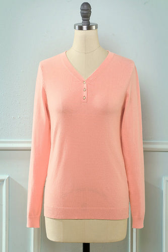 Suéter de punto rosa