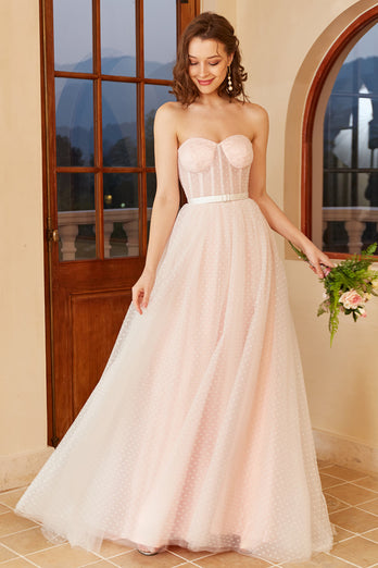 Vestido de novia de lunares rosas con mangas de hojaldre