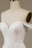 Vestido de novia asimétrico de gasa boho marfil con encaje
