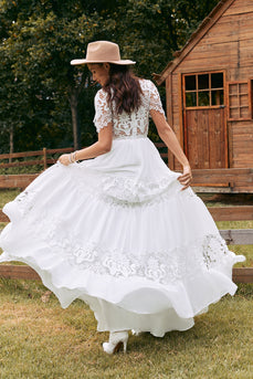 Vestido de novia de gasa boho de manga corta marfil con encaje