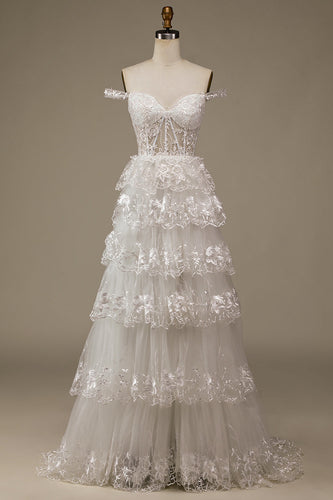 Vestido de novia de encaje blanco brillante con hendidura