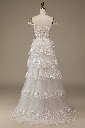 Vestido de novia de encaje blanco brillante con hendidura