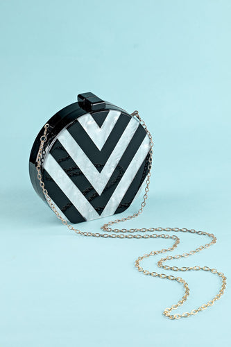 Bolso acrílico de rayas blancas y negras