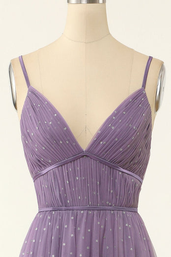 Una línea de vestido largo de dama de honor con volantes