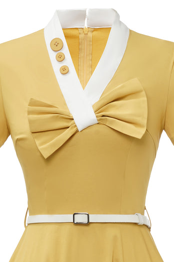 Vestido amarillo de estilo retro de la década de 1950 con lazo