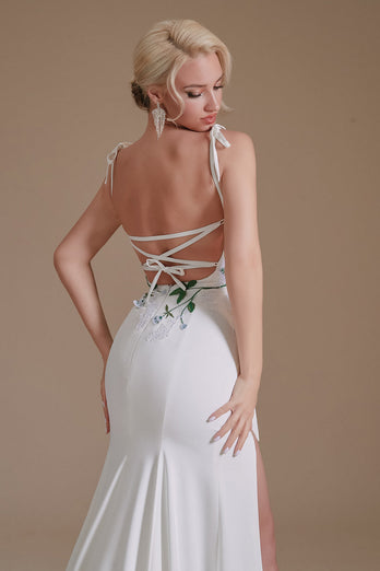 Vestido de novia blanco de sirena sin espalda con apliques